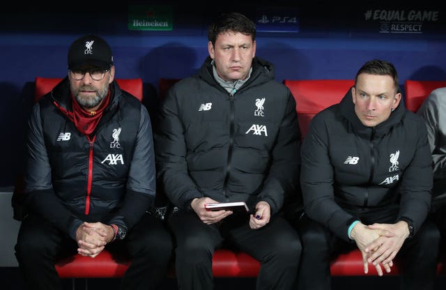 Liverpool assistant coach Peter Krawietz, centre, has been holding fort in the absence of Jurgen Klopp, left, and Pepijn Lijnders