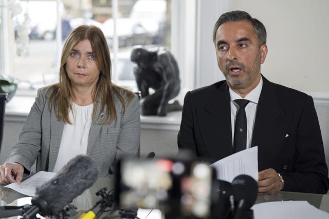 Tracy Scott, left, sitting alongside Aamer Anwar at a press conference