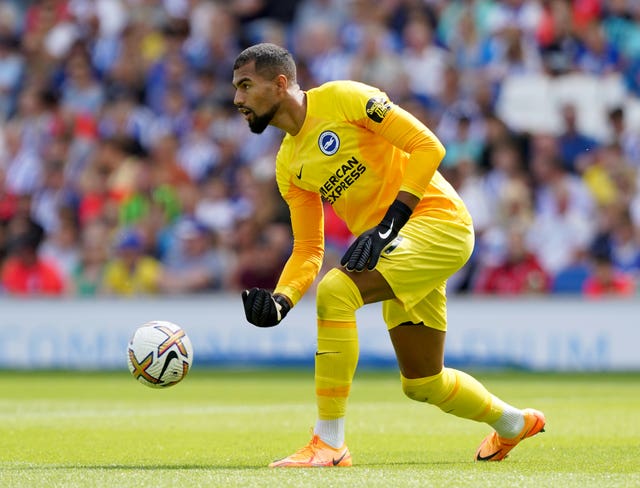 Brighton and Hove Albion goalkeeper Robert Sanchez rolls out the ball