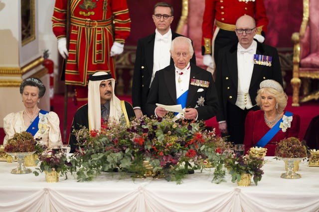 The King and Queen with the Emir of Qatar Sheikh Tamim bin Hamad Al Thani and The Princess Royal during a state banquet at Buckingham Palace