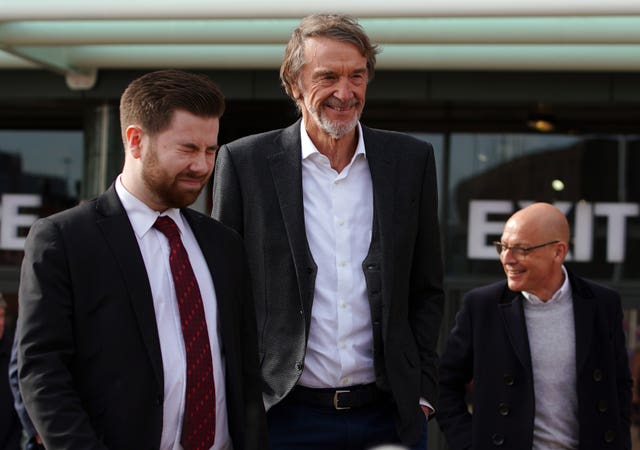 Sir Jim Ratcliffe, centre, is set to purchase a 25 per cent stake in Manchester United