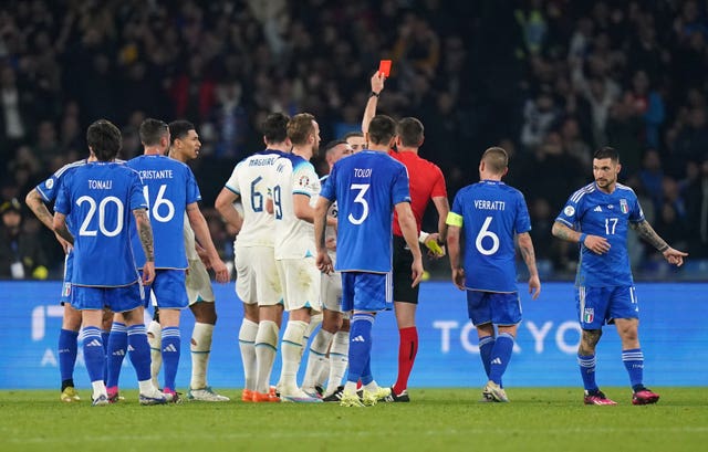 England had to dig deep after Luke Shaw (hidden) was sent off