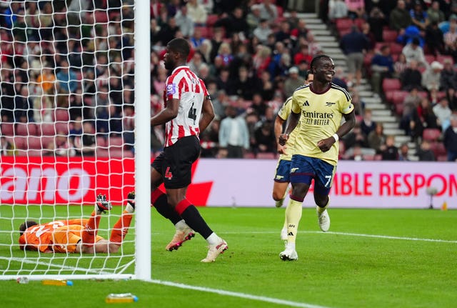 Bukayo Saka celebrates
