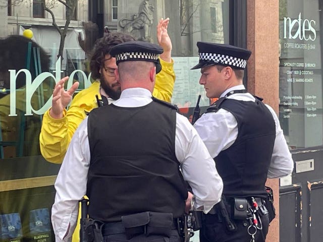 Handout photo taken with permission from the Twitter account of @Labour4Republic of a anti monarchy protester being arrested in central London on Saturday May 6, 2023