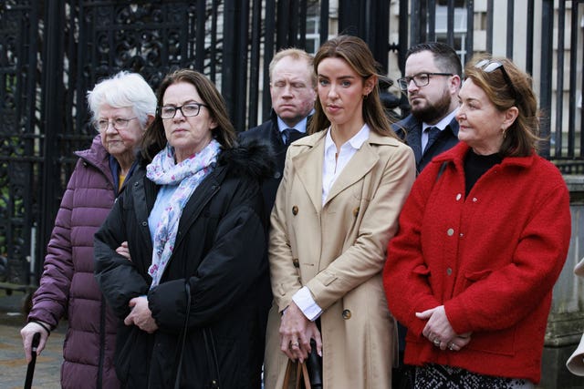 The mother and sisters of Patrick Vincent, Rose Vincent, Ann Vincent and Marian Vincent , Ronan McCourt, solicitor for the Clancy family, solicitor Karl Mallon for the Vincent family, and Deirdre Clancy, sister of Peter Clancy, outside Belfast High Court