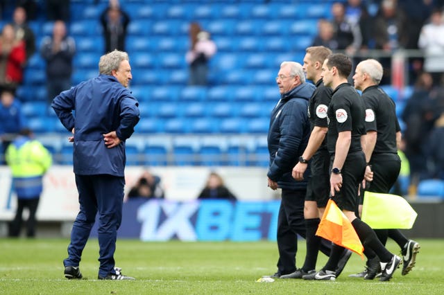 Cardiff manager Neil Warnock, left, had a staredown with referee Craig Pawson and his assistants