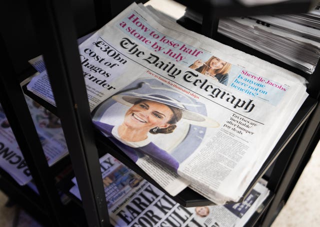 Copies of the Daily Telegraph newspaper on sale 