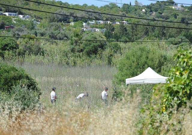 Police search scrubland