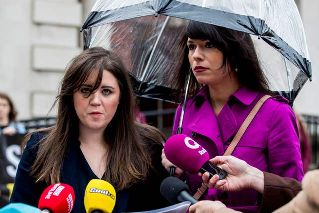 Jemma Conlon (left) and Grainne Teggart, speak to the media outside court