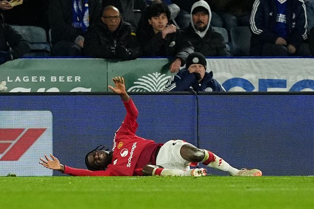 Ayden Heaven lays on the floor injured at the King Power Stadium