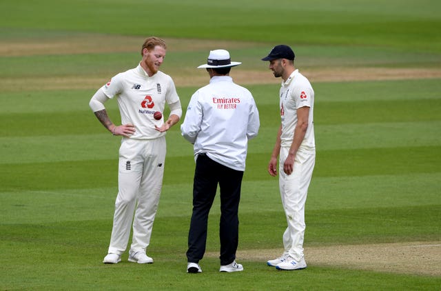 England's Ben Stokes (left) and Mark Wood 