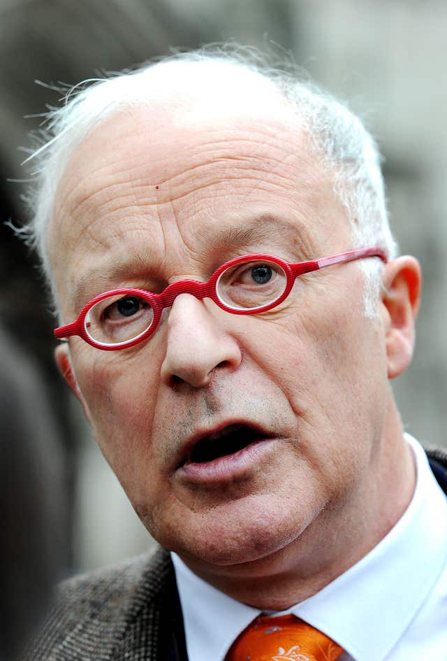 Phil Shiner reads a statement outside the High Court