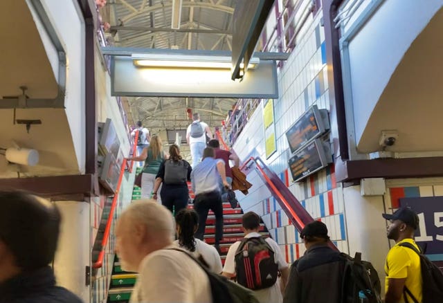 People running through Clapham Junction station