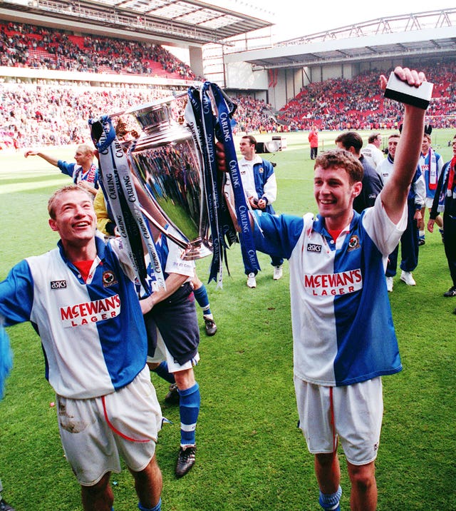 Blackburn strike-partners Alan Shearer (left) and Chris Sutton celebrate the club's title success in 1994-95