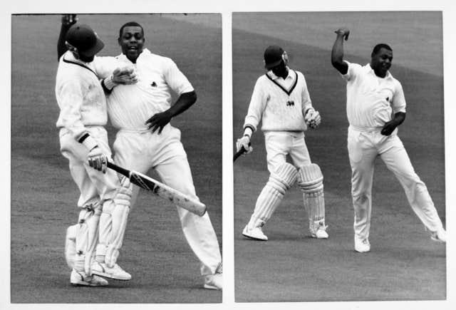 England's David Lawrence collides with Sri Lanka’s Ranjith Madurusinghe while celebrating a wicket