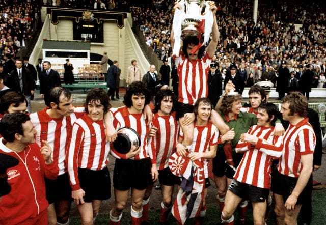 Sunderland's captain Bobby Kerr is held aloft by team-mates Billy Hughes and Jim Montgomery after the FA Cup Final victory