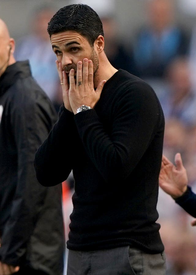 Mikel Arteta puts his hands to his face during Arsenal's game at Newcastle last season