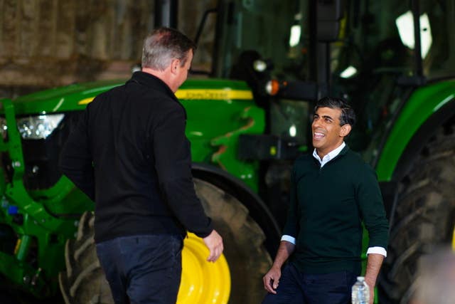 Foreign Secretary Lord David Cameron and Prime Minister Rishi Sunak on a farm