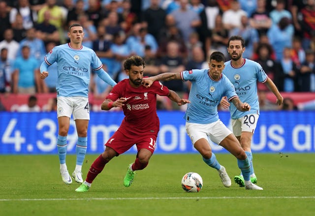 Liverpool’s Mohamed Salah and Manchester City’s Joao Cancelo