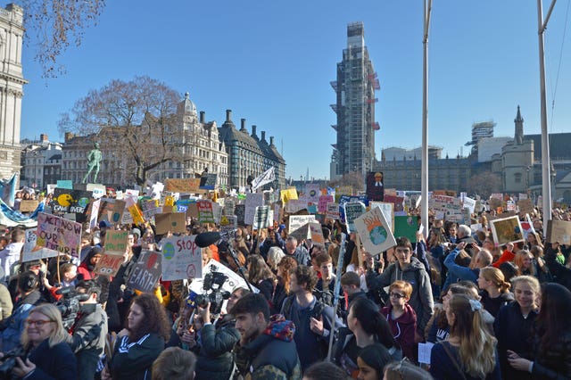 Students from the Youth Strike 4 Climate movement during a climate change protest on Parliament Square in Westminster, London