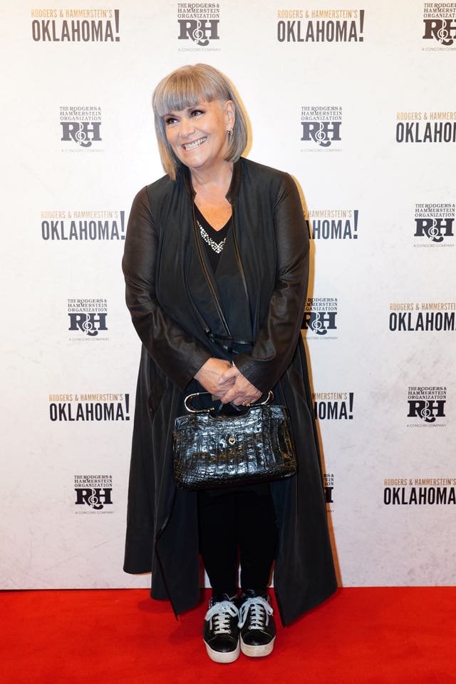 Dawn French poses for photographers at the opening night of Oklahoma! – London