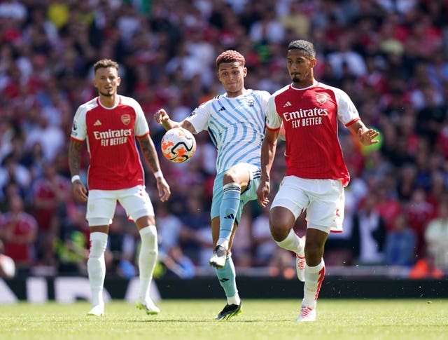 William Saliba (right) battles for the ball with Nottingham Forest's Brennan Johnson