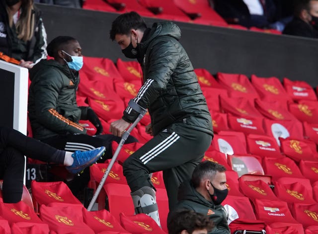 Harry Maguire in the stands on crutches as Manchester United take on Leicester