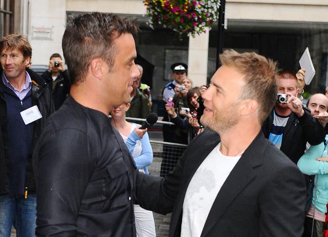 Gary Barlow and Robbie Williams At Radio 1 – London