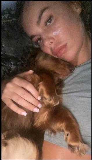 Ashley Dale and her dachshund Darla in a photograph taken less than an hour before her death