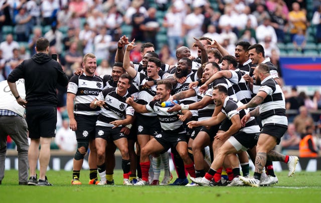 Barbarians players celebrate after their 52-21 win at Twickenham in June