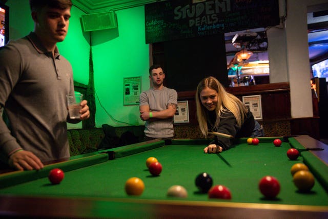 The pool table had also been dormant during the months when drinking had been an outdoors activity (Jacob King/PA)