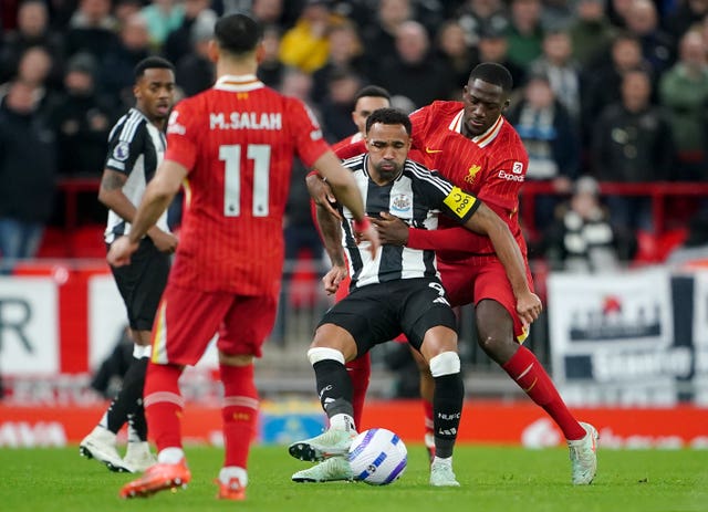 Newcastle striker Callum Wilson in action at Liverpool