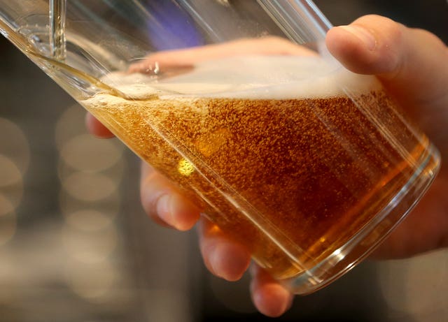 Someone pouring a lovely pint