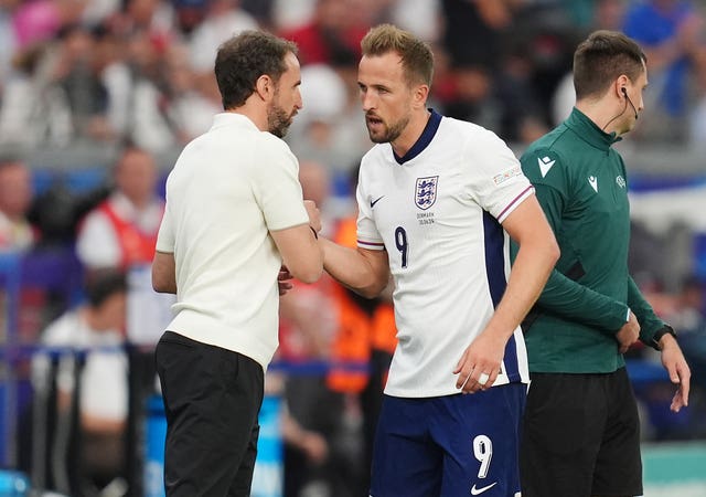 England manager Gareth Southgate with Harry Kane as he is substituted against Denmark 