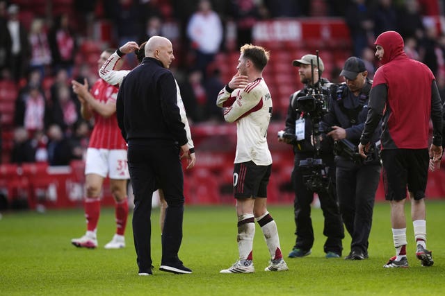Liverpool’s Alexis Mac Allister, centre, and manager Arne Slot, left, discuss the midfielder's disallowed goal against Nottingham Forest