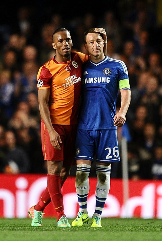 Galatasaray's Didier Drogba (left) and Chelsea's John Terry after playing against each other in the Champions League