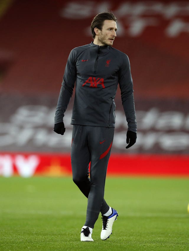 Liverpool defender Ben Davies warms up at Anfield