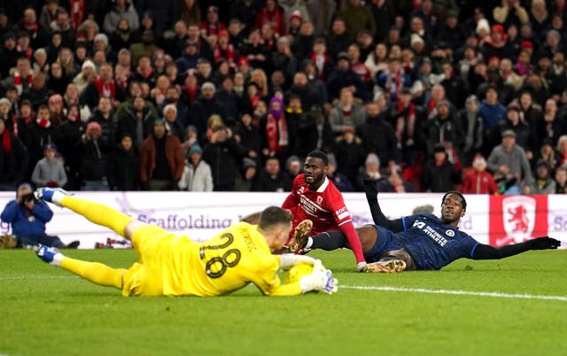 Middlesbrough''s Emmanuel Latte Lath, centre, sees his shot saved by Chelsea goalkeeper Djordje Petrovic, left