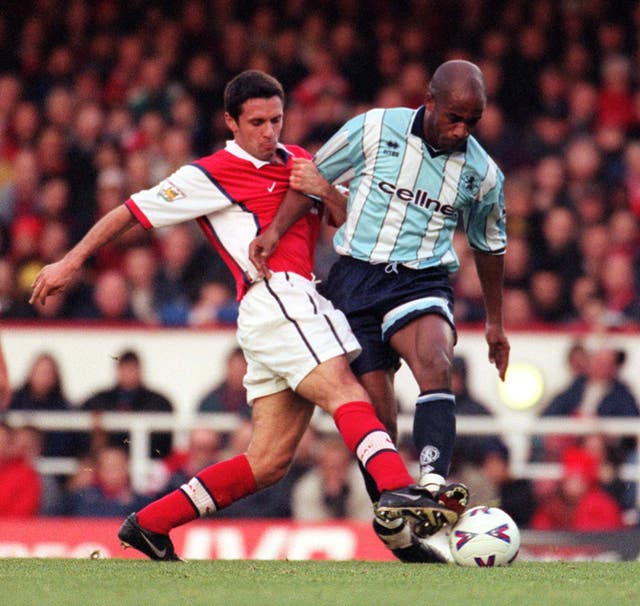 Remi Garde, left, spent three seasons with Arsenal as a player 