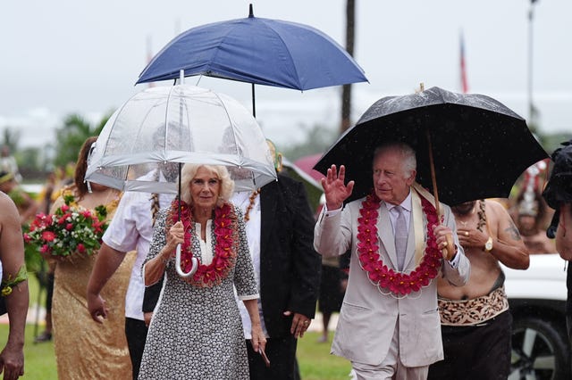 King Charles III and Queen Camilla arrive for a farewell ceremony at Siumu Village on the final day of the royal visit to Australia and Samoa