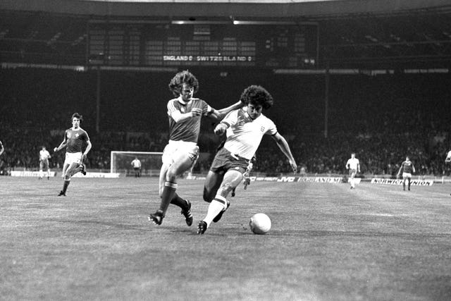 Kevin Keegan (right) in action for England (PA)