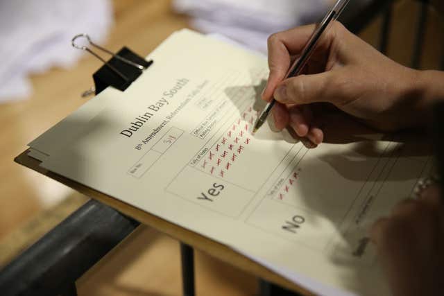 A tally keeper at work as votes are counted (Brian Lawless/PA)