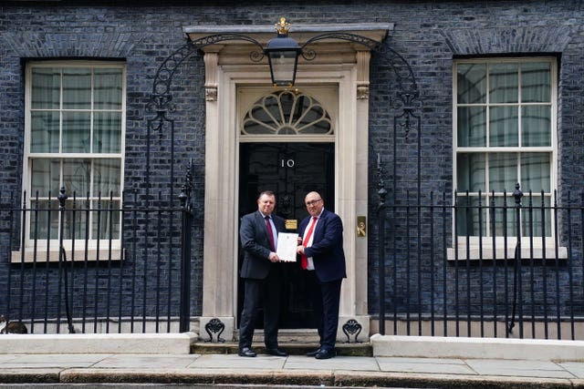 Chairman of the Police Federation John Apter (left) and Ken Marsh, Chairman of the Metropolitan Police Federation deliver a letter to 10 Downing Street, London (Victoria Jones/PA)