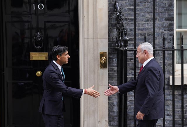 Prime Minister Rishi Sunak, left, welcomes Mr Netanyahu to 10 Downing Street ahead of a meeting 