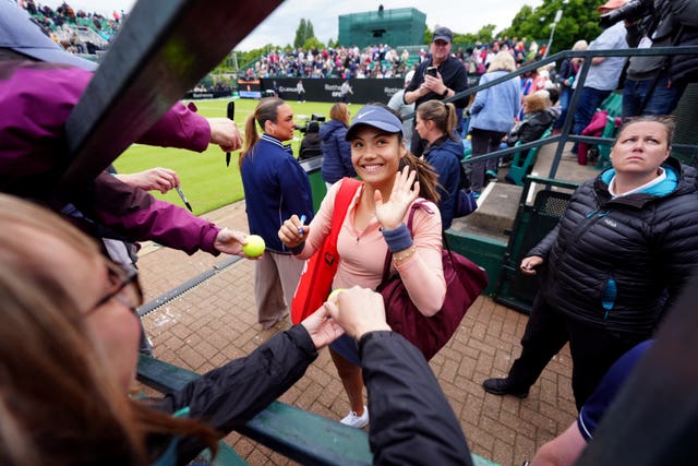 Emma Raducanu waves at fans as she signs autographs in Nottingham