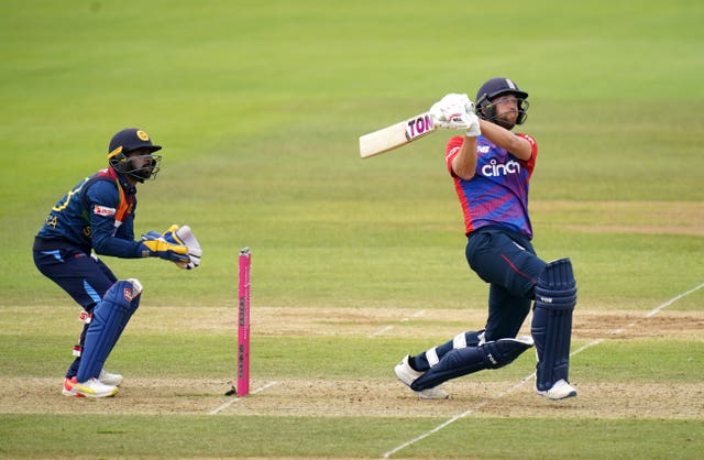 Dawid Malan hits a six as his innings guided England to a T20 victory over Sri Lanka 