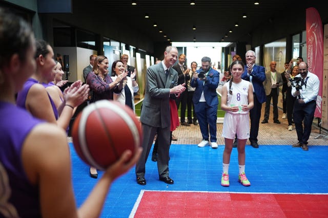 Edward with basketball player