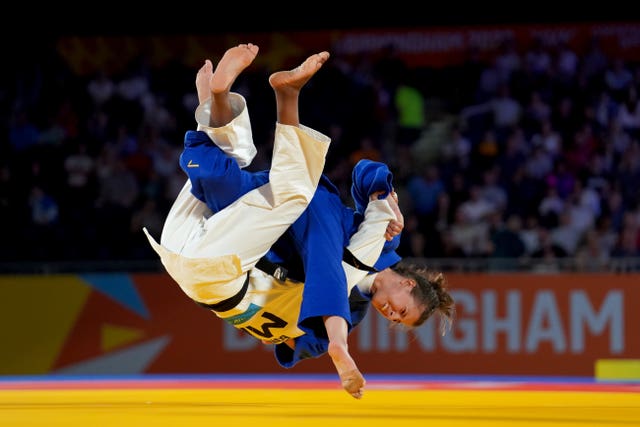 English judoka Amy Platten, in blue, takes on Malawi's Harriet Bonface at the Commonwealth Games in Birmingham. Platten wasted little time in winning the bronze medal match in the women's 48kg category as she swiftly shook off the disappointment of her semi-final defeat to South Africa's Michaela Whitebooi. She required just 14 seconds to claim the final podium place after expertly executing an Ippon