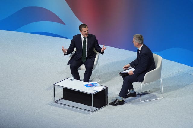 Conservative Party leadership candidate Robert Jenrick speaks to Christopher Hope on stage at Conservative Party Conference