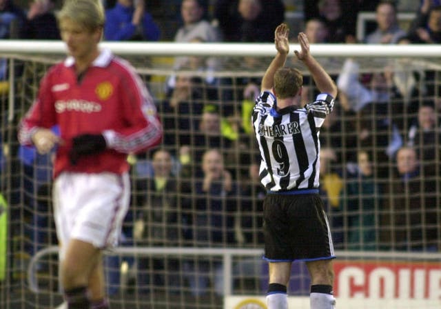 Alan Shearer salutes Newcastle's fans after firing his side's fourth goal against United in 1996
